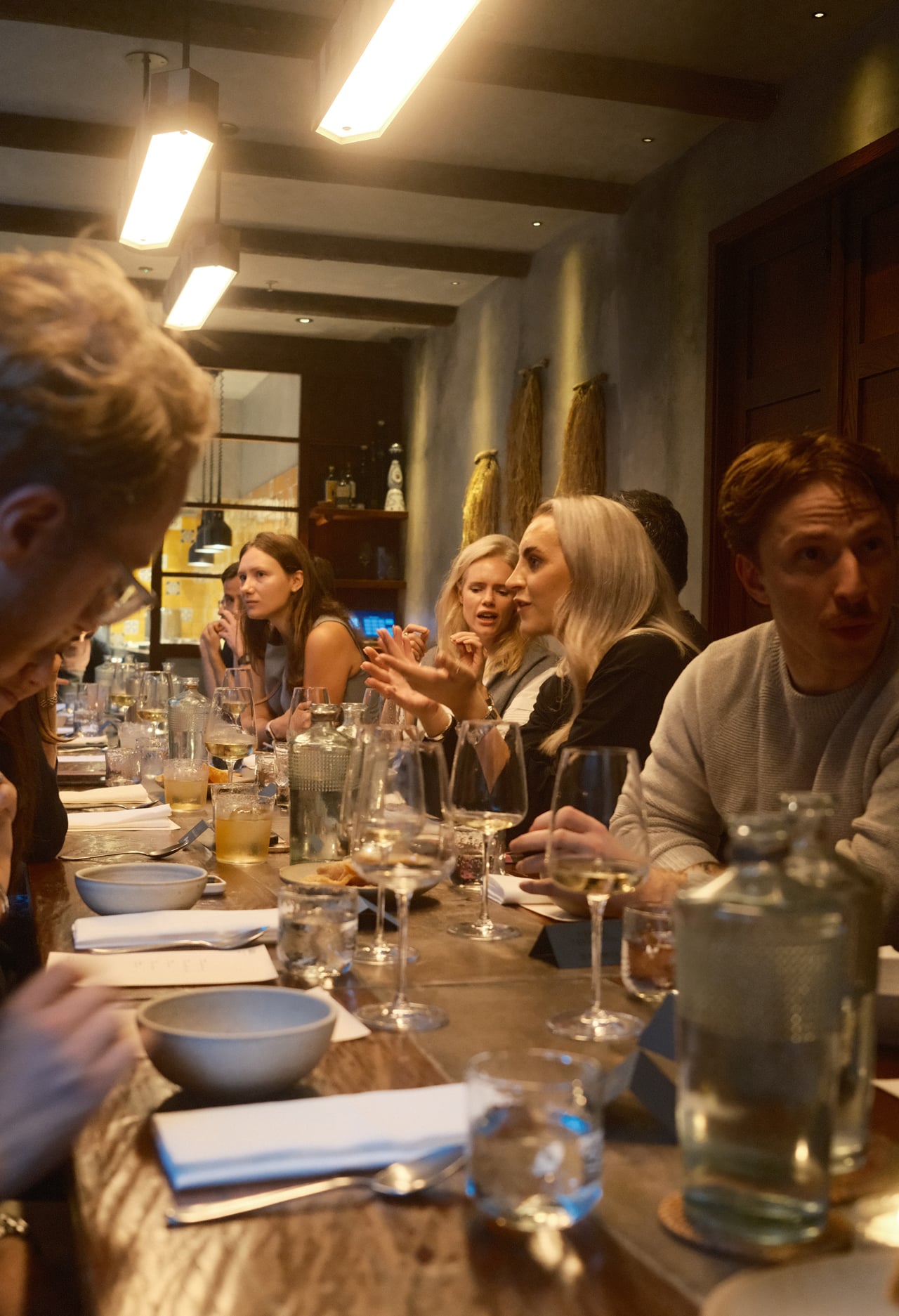 Kiera Johnson talking with guests at the last Cubiq AI Talent Dinner